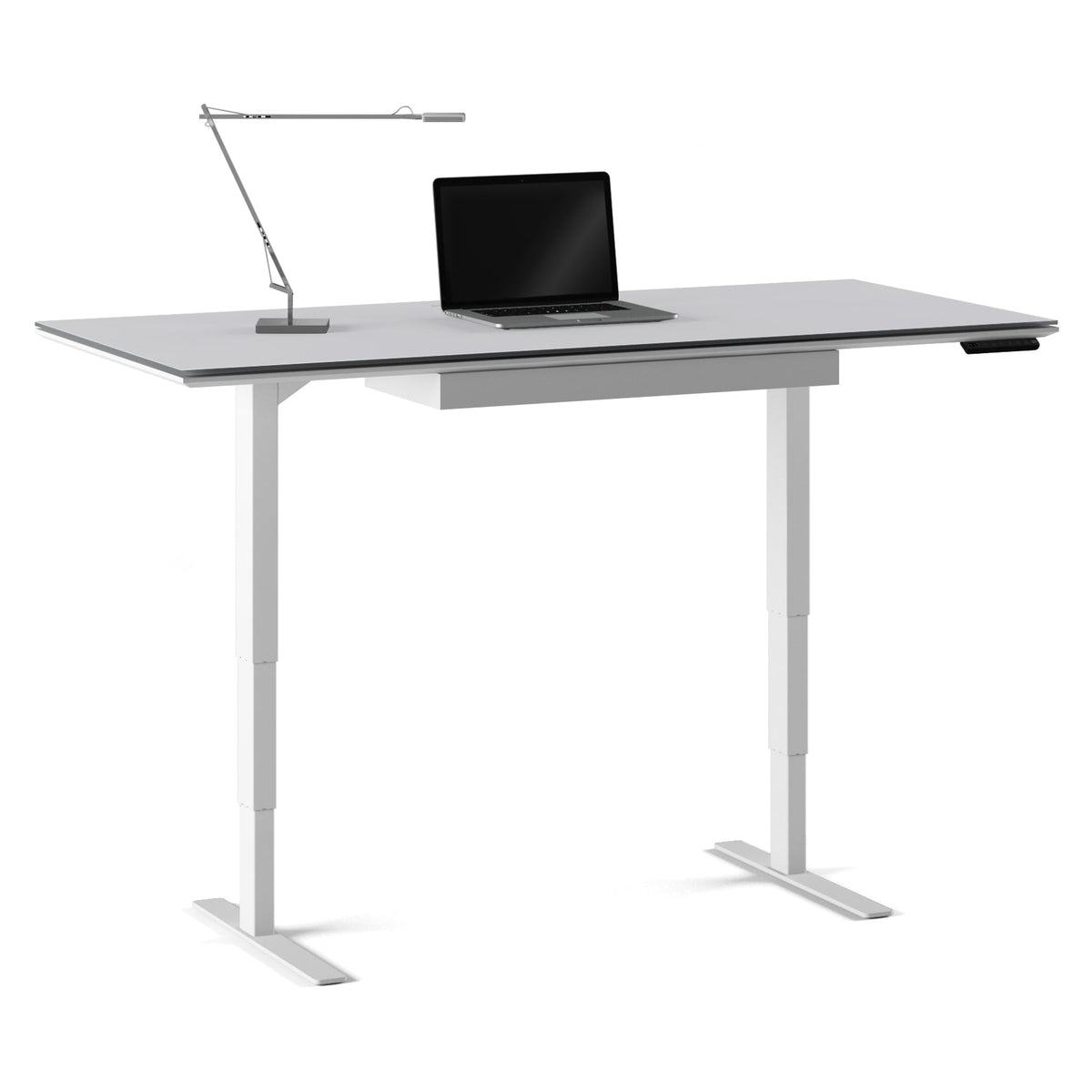 BDi Centro Sit+Stand Desk in Satin White on Oak with Grey Glass, 30 x 66 inch top, raised, with a lamp and laptop, on white, 30" x 66" Top size