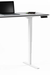 BDi Centro Sit+Stand Desk in Satin White on Oak with Grey Glass, 24 x 60 inch top, raised, end with the keypad, on white, 24" x 60" Top size