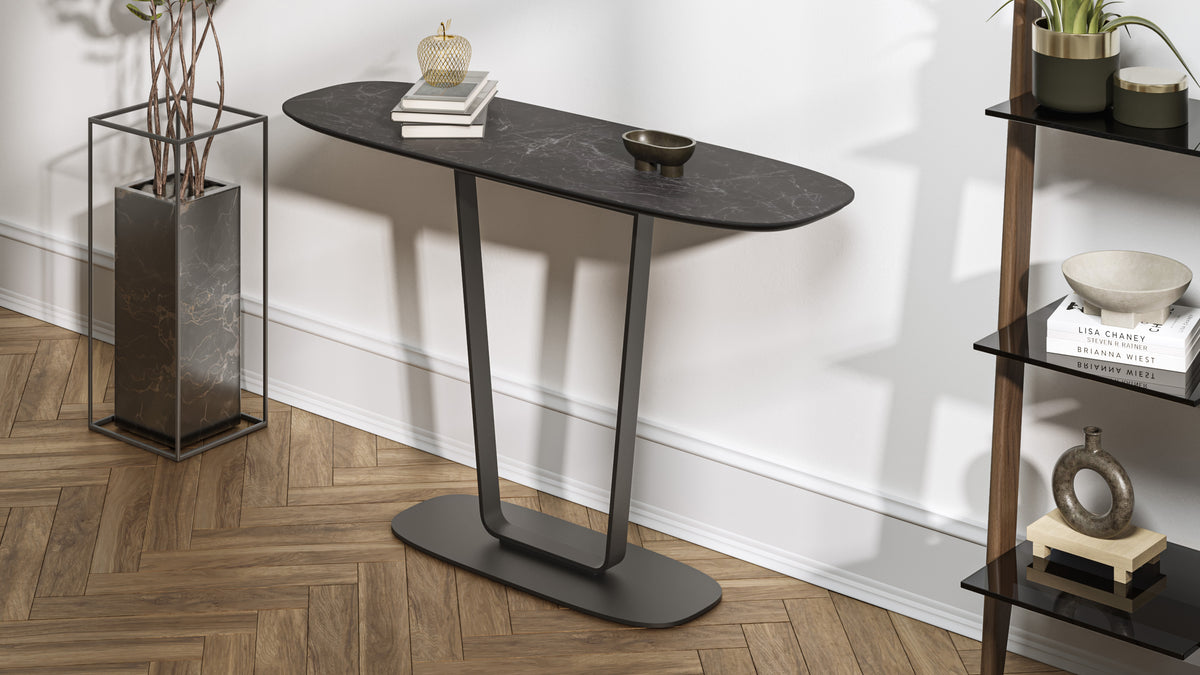 BDi Cloud 9 1183 Console Table in Nimbus Black, angled view in a hallway beside a shelf
