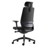 BDi Coda Modern Home Office Task Chair in Black/Grey High Performance Fabric, three-quarter rear view from the left, on white