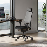 BDi Coda Modern Home Office Task Chair in Black/Grey High Performance Fabric, beside a standing desk, in a home office