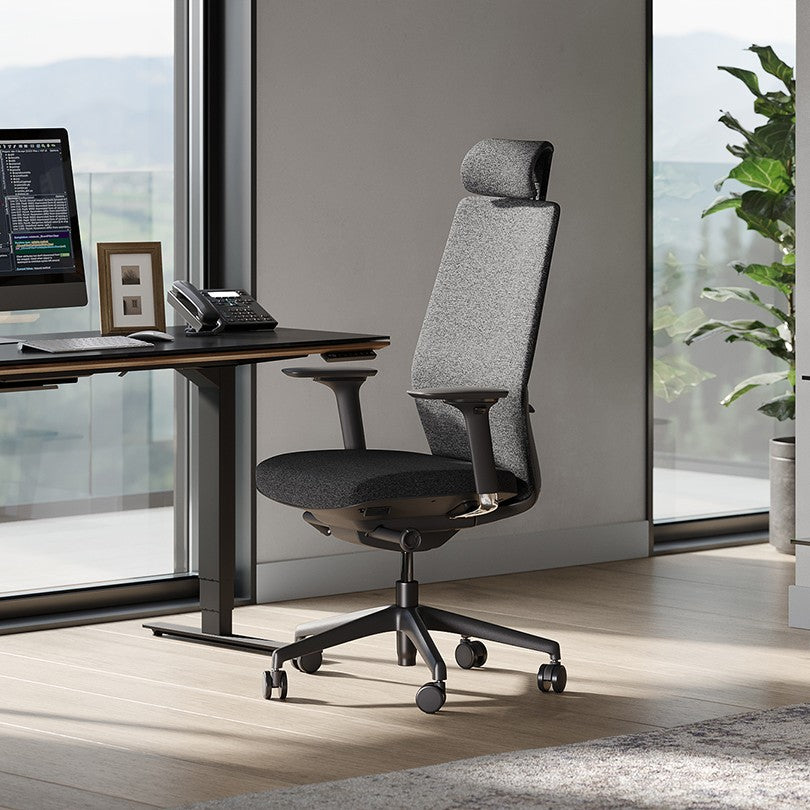 BDi Coda Modern Home Office Task Chair in Black/Grey High Performance Fabric, beside a standing desk, in a home office