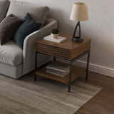 BDi Cora 1176 End Table in Natural Walnut, beside a sofa with the matching coffee table
