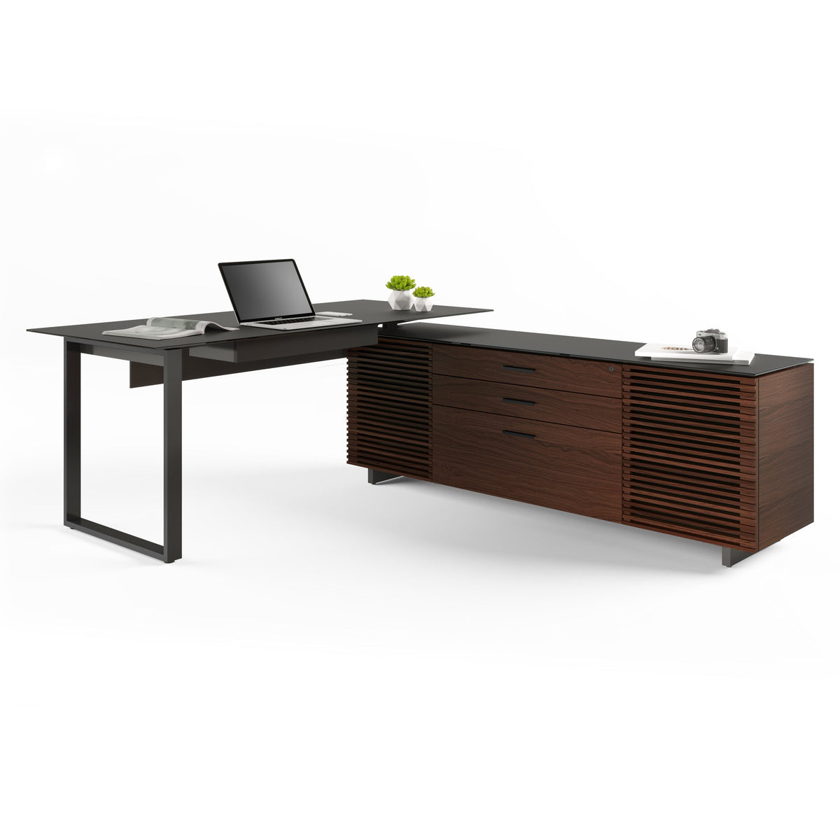 BDi Corridor 6531 L-Shaped Office Desk in Chocolate Stained Walnut, angled view with a laptop, on white