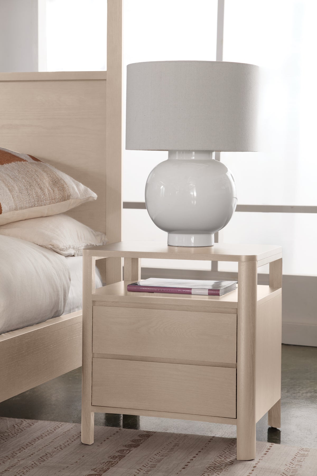 West Bros Curva Night Table in 45 Weathered Wood, in a room setting