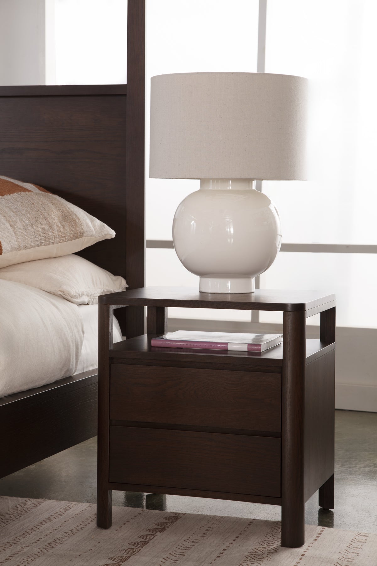 West Bros Curva Night Table in 22 Mocha, in a room setting