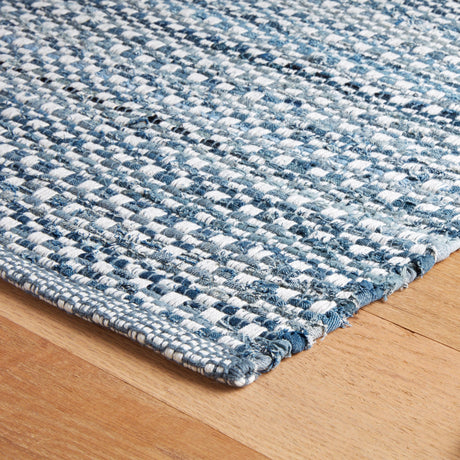 Dash & Albert Denim Stone Handwoven Cotton Rug in Blue, corner detail