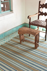 Dash & Albert Heron Stripe Handwoven Cotton Rug in Blue, room setting