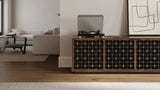 BDi Elements 8703 Media + Storage Cabinet in Natural Walnut, with a turntable, in a living room, with Constellation door fronts