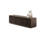 BDi Elements 8703 Media + Storage Cabinet in Toasted Oak, angled from the right with decor, on white, with Tune door fronts
