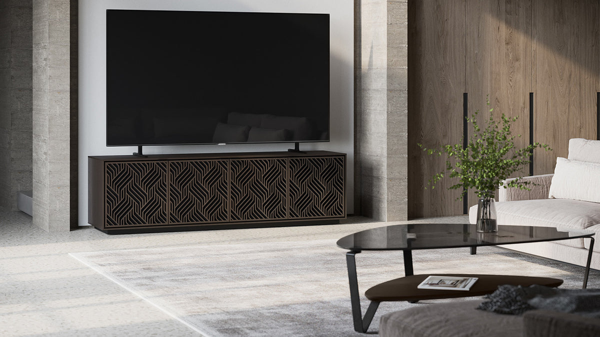BDi Elements 8703 Media + Storage Cabinet in Toasted Oak, in a living room under a TV, with Weave door fronts