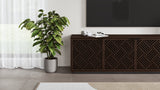 BDi Elements 8703 Media + Storage Cabinet in Toasted Oak, under a TV, beside a plant, with Weave door fronts