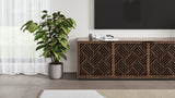 BDi Elements 8703 Media + Storage Cabinet in Natural Walnut, under a TV, beside a plant, with Weave door fronts