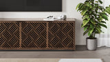BDi Elements 8703 Media + Storage Cabinet in Natural Walnut, close view under a TV, beside a plant, with Weave door fronts