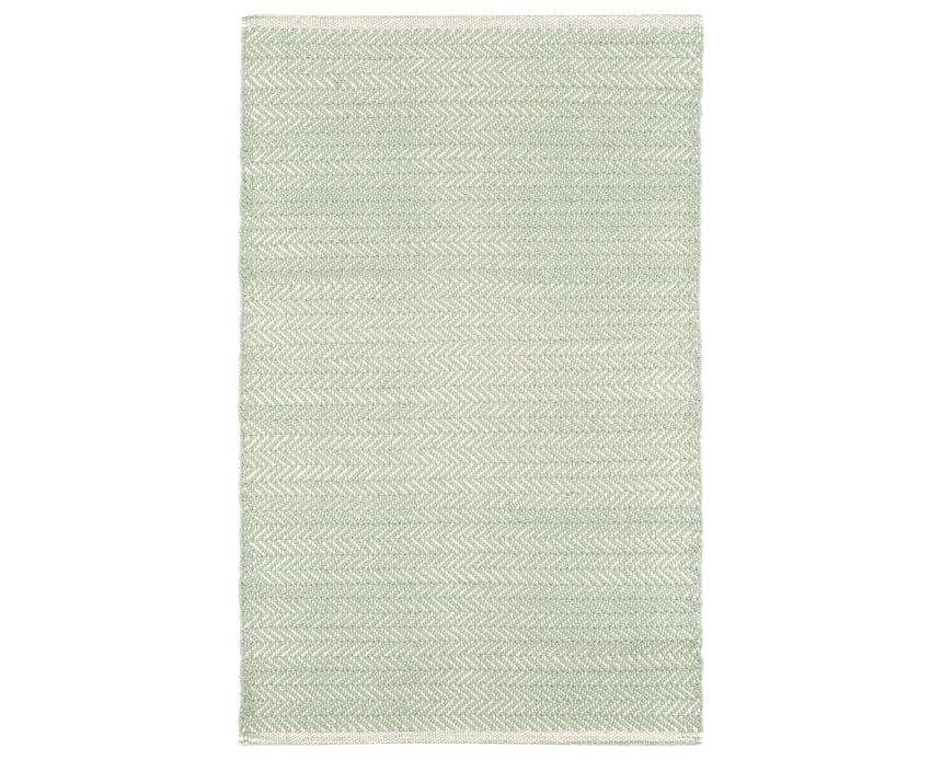Rug with a Herringbone Handwoven pattern on a plain background