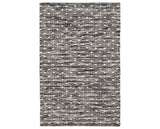 Rug with a Hobnail Handwoven pattern on a plain background