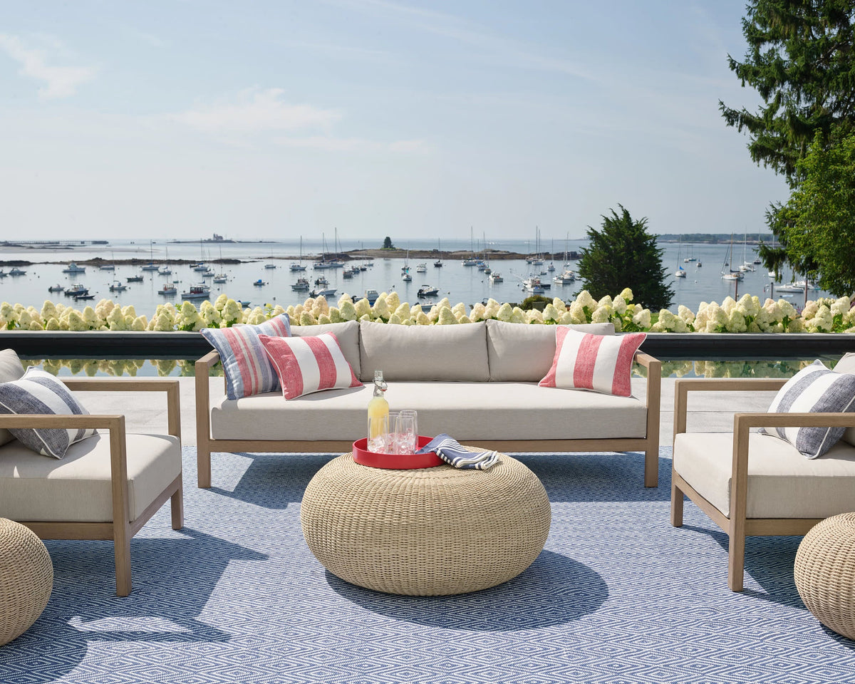 Dash & Albert Diamond Handwoven Indoor/Outdoor Rug in Denim / White, patio setting