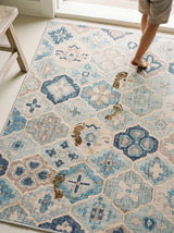 Dash & Albert Pali Machine Washable Rug in Blue, with wet footprints