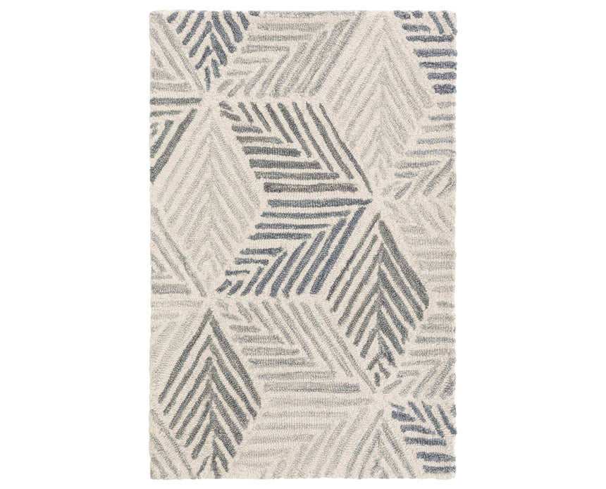 Rug with a Karari Hand Hooked pattern on a plain background