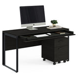 BDi Linea 6221 Desk in Charcoal Stained Ash, keyboard drawer open, with a mobile file and monitor, on white