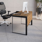 BDi Linea 6221 Desk in Natural Walnut, in an office with a matching bookcase