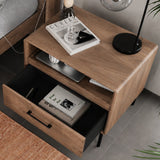 BDi Linq Nightstand in Natural Walnut, 28-inch with the drawer open, beside a bed