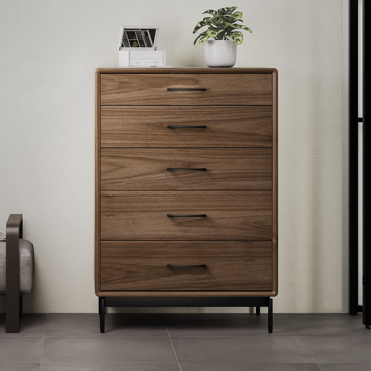 BDi Linq 9185 5 Drawer Chest in Natural Walnut, in a room beside an upholstered bench