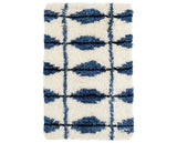 Rug with a Noma Handwoven pattern on a plain background