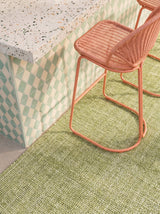 Dash & Albert Fusion Handwoven Indoor/Outdoor Rug in Sage, outdoor bar close-up