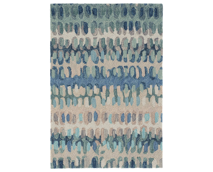 Rug with blue and beige abstract pattern on a white background