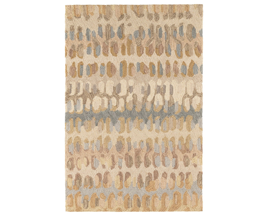 Patterned rug with beige and brown tones on a white background