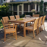 Wooden outdoor dining set with table and chairs on a stone patio