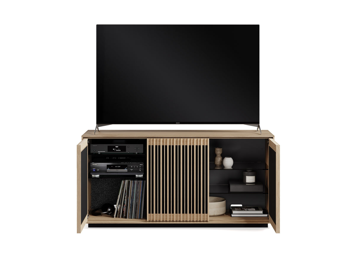 BDi Profile 8477 3-Door Media & Storage Console in Washed Oak, outer doors open with a TV and media equipment, on white
