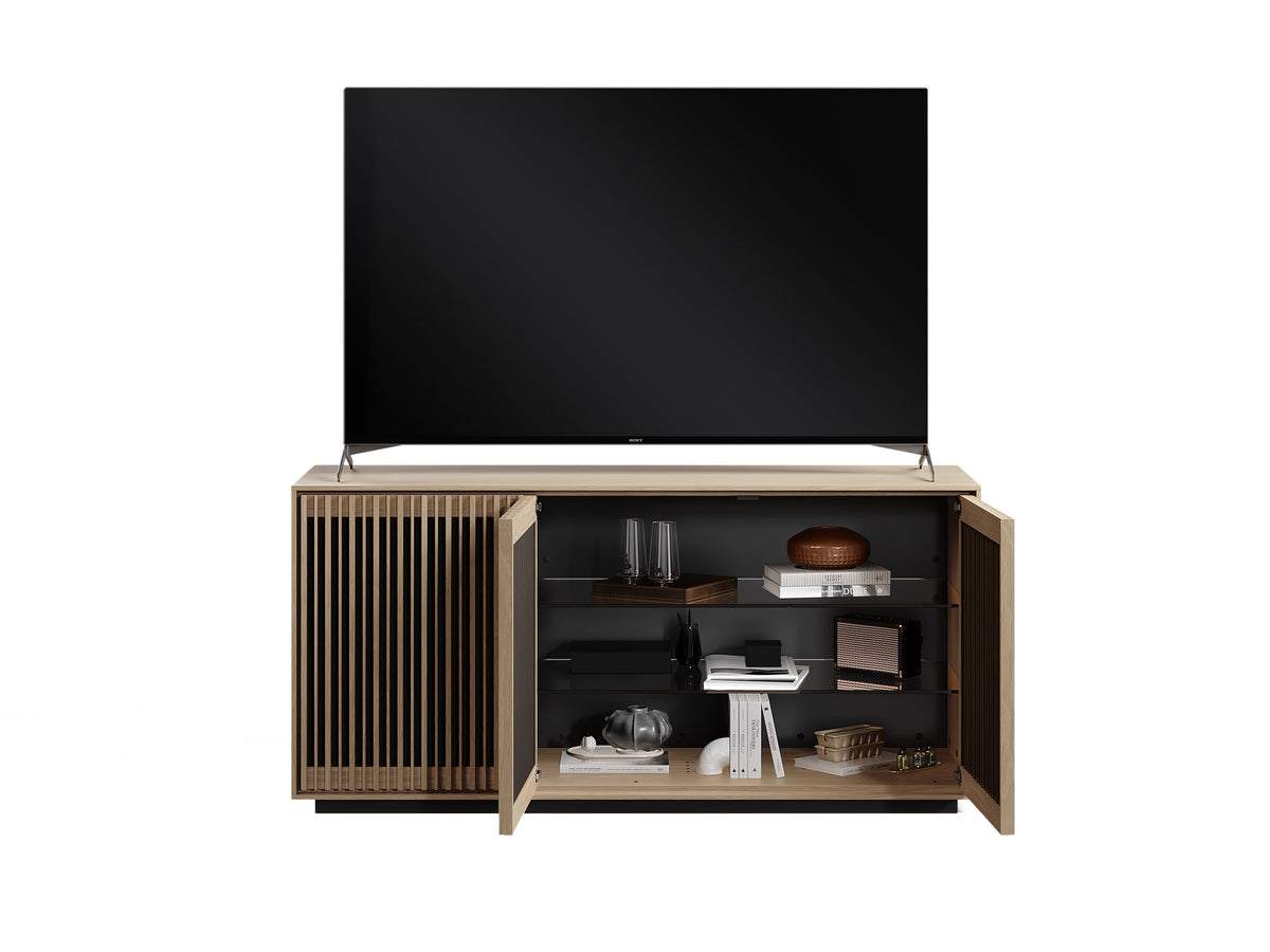 BDi Profile 8477 3-Door Media & Storage Console in Washed Oak, two doors open with a TV, on white