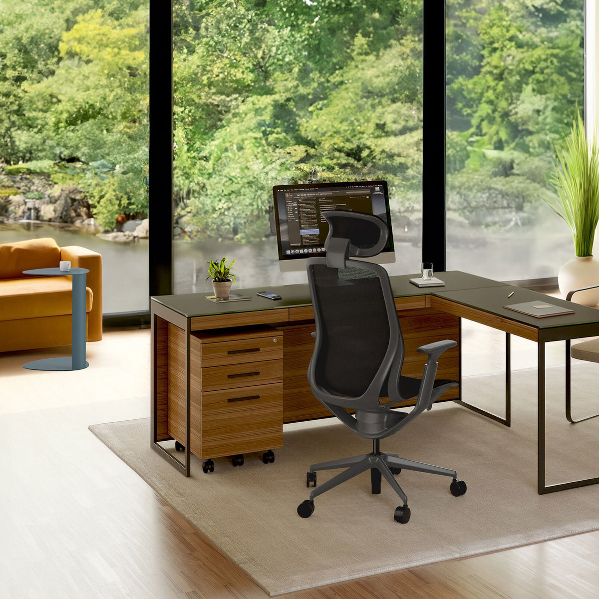 BDi Sequel 20 6101 Desk in Natural Walnut, with a black frame, return and mobile file, in a home office by a window
