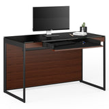 BDi Sequel 20 6103 Compact Laptop Desk in Chocolate Stained Walnut, with a black frame, keyboard drawer open, with a monitor, on white