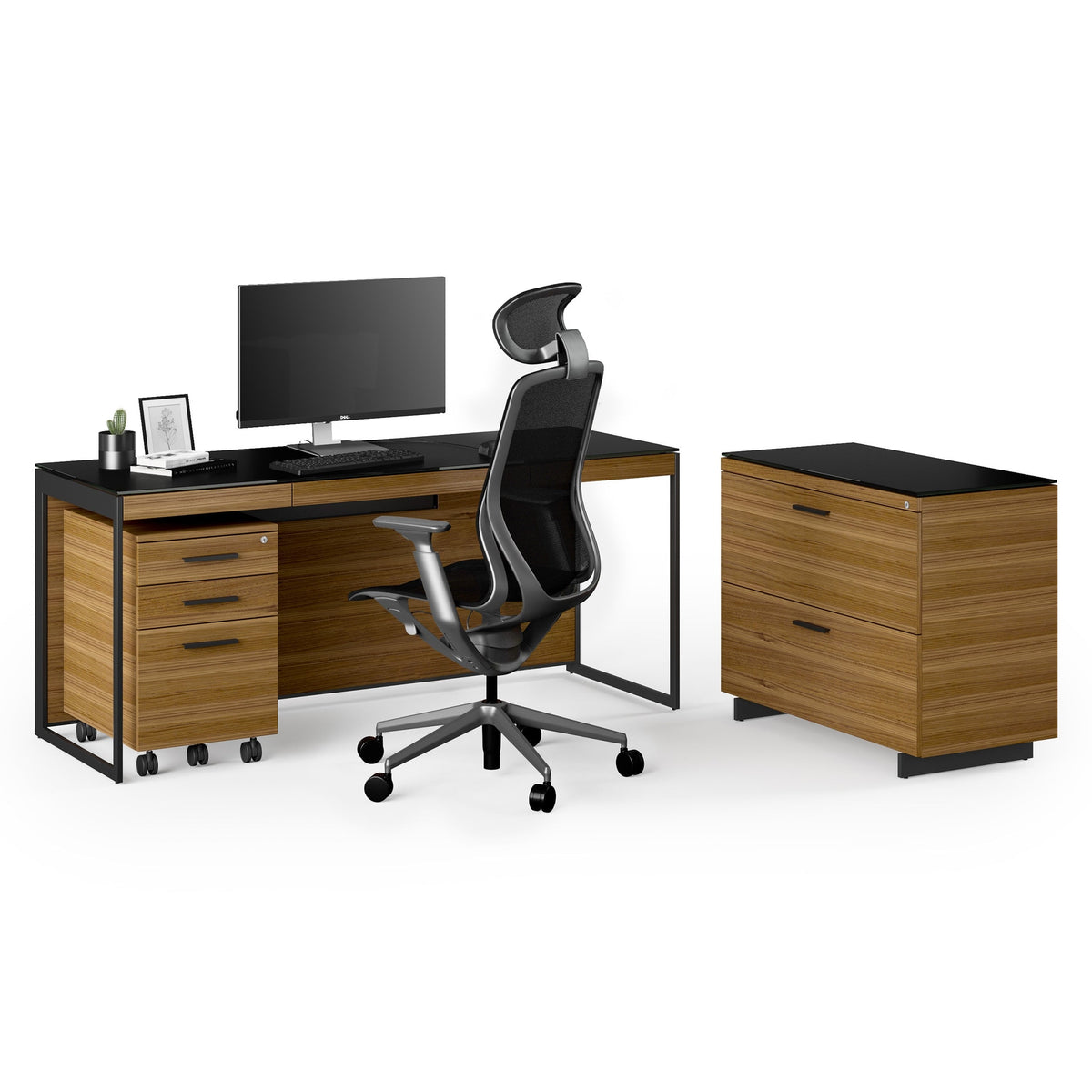 BDi Sequel 20 6116 Lateral File Cabinet in Natural Walnut, with a black base, beside a desk and mobile file, on white