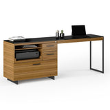 BDi Sequel 20 6112 Desk Extension in Natural Walnut, with a black frame, on a multi-function cabinet, on white