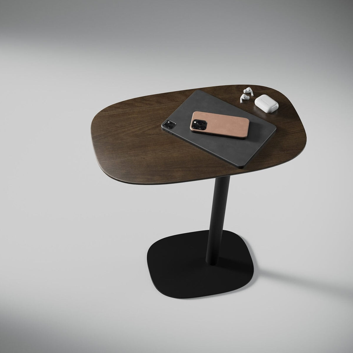 BDi Serif 1045 Adjustable Side/Laptop Table in Toasted Oak, in a room setting