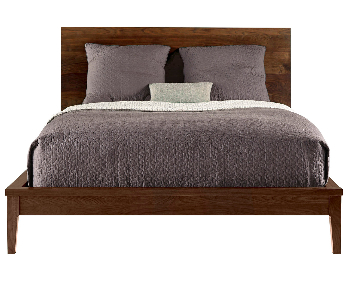 West Bros Serra Platform Bed in 80 Walnut, with the wood headboard, on white