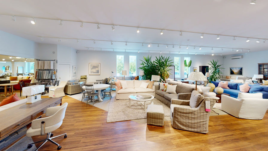 Valley Ridge Furniture showroom floor with sofas, chairs and dining sets